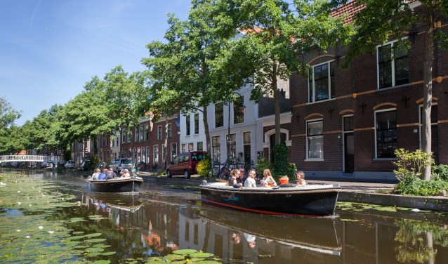 Pruttelen op nostalgische Solexen door De glazen stad & Midden-Delfland